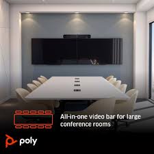 Modern meeting room with dual displays, a video conferencing bar and table controller